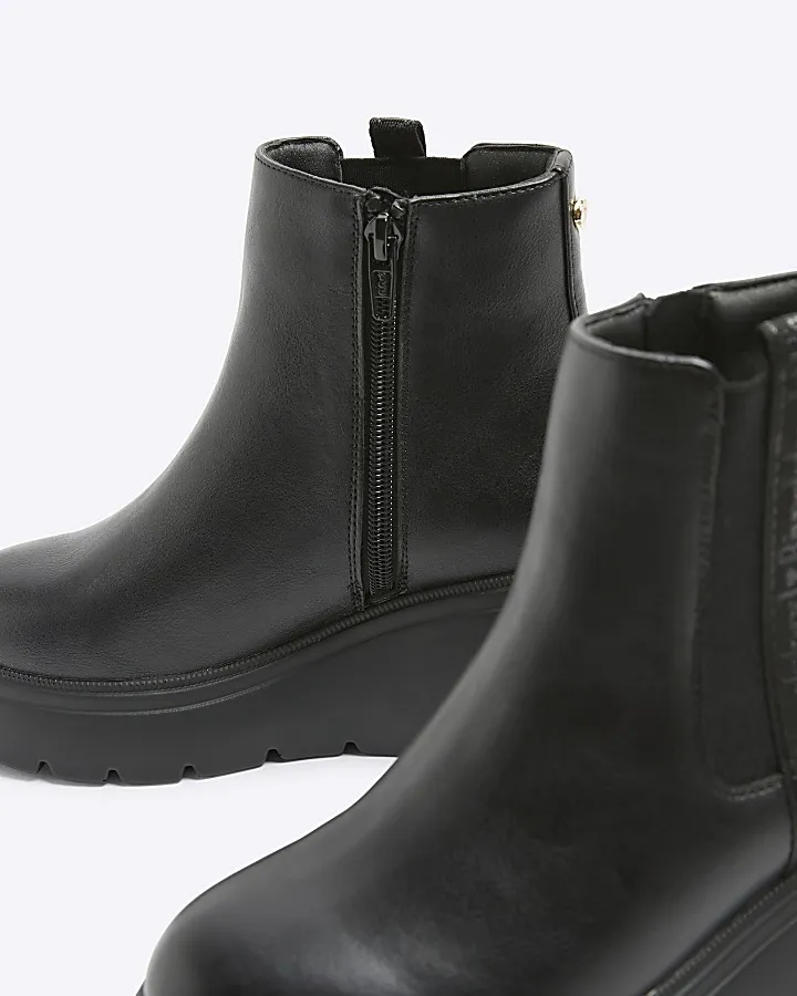 Girls black wedge boots