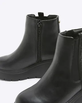 Girls black wedge boots