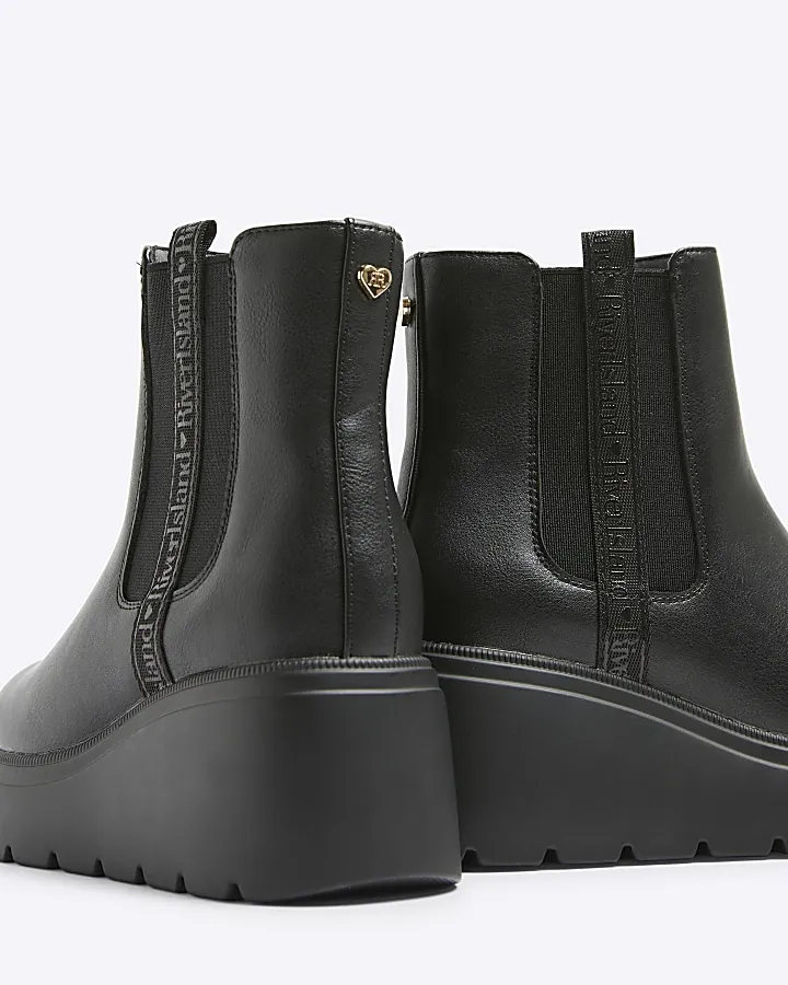 Girls black wedge boots