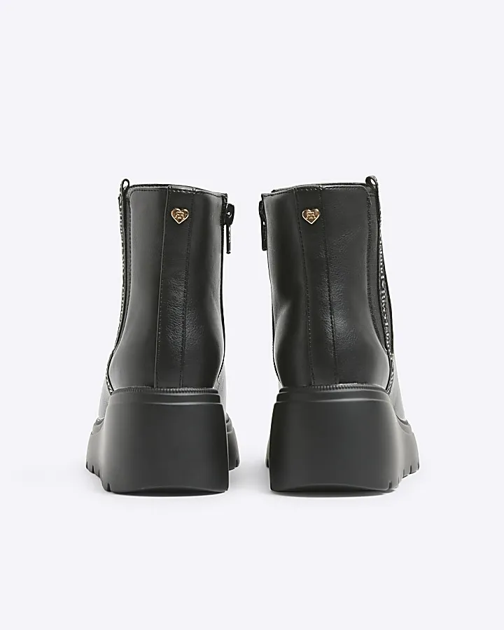 Girls black wedge boots